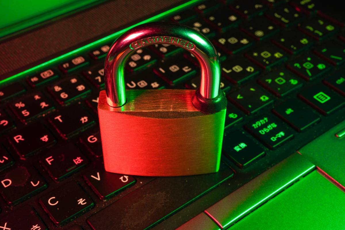 Illustration showing synchronized padlocks on smartphone, laptop, and tablet with device and password management labels